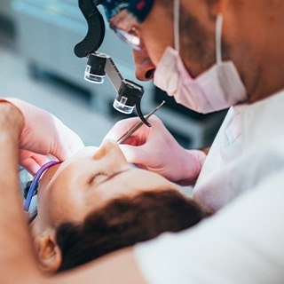 A dentist performing a root canal
