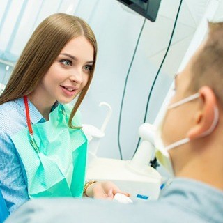 A woman at her dental checkup.