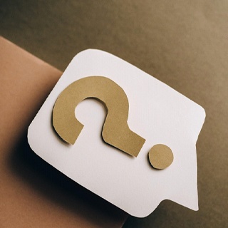 Question mark on paper card