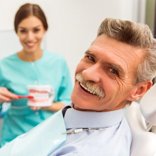 a man smiling with dentures in Pembroke Pines