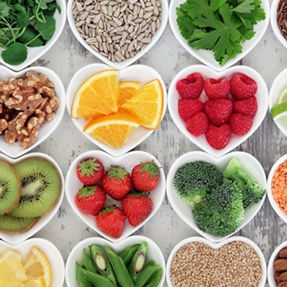 Assortment of different foods in heart shaped bowls