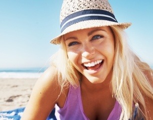 Woman with gorgeous smile on the beach