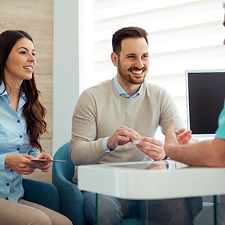 Coupling talking to dentist in office