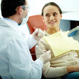 Patient and dentist discuss candidate for oral conscious sedation in Pembroke Pines