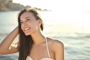 Smiling woman at beach