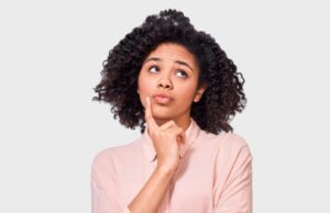 Woman wearing curious expression